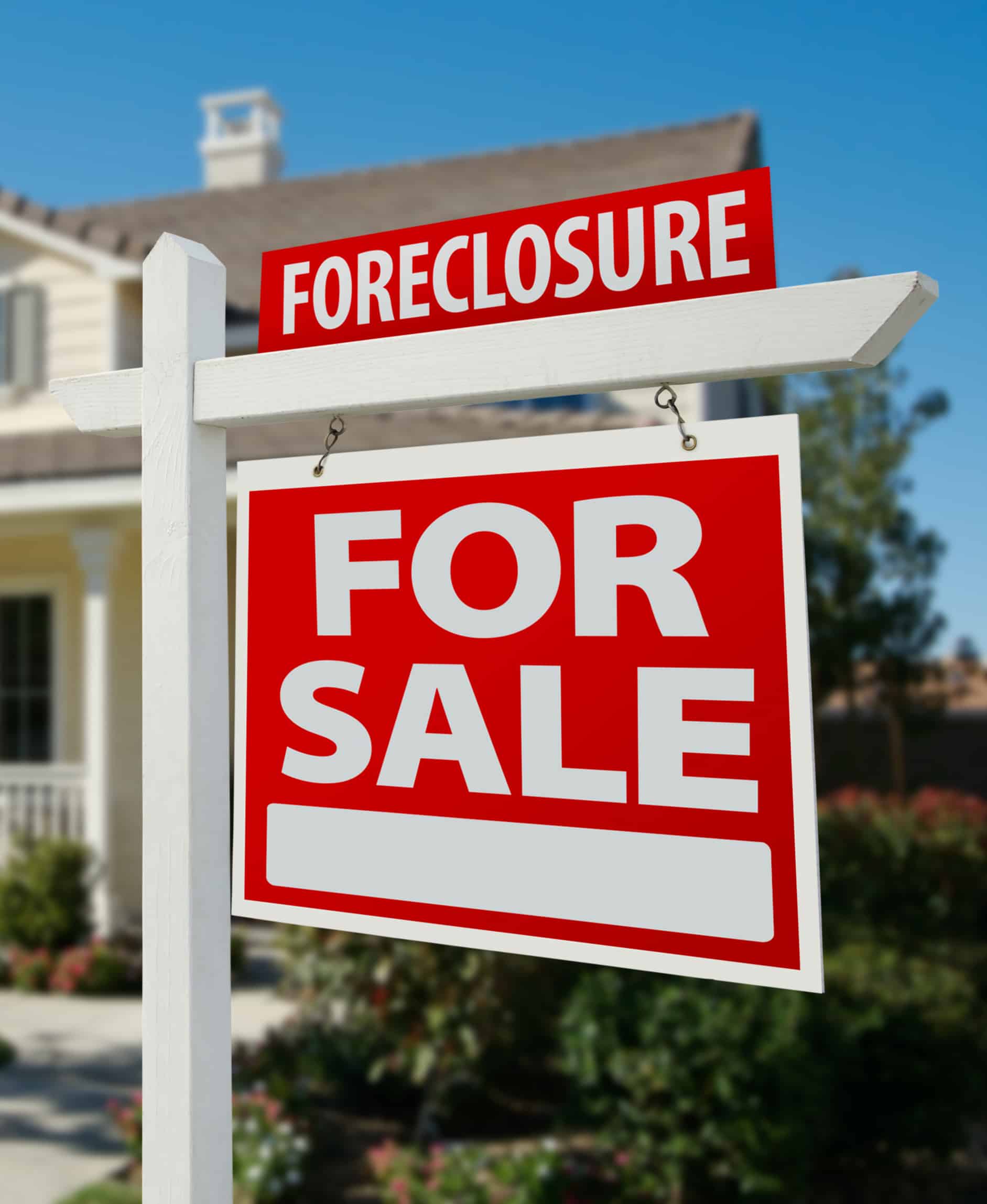 Foreclosure help in Oklahoma Foreclosure Home For Sale Real Estate Sign in Front of New House.