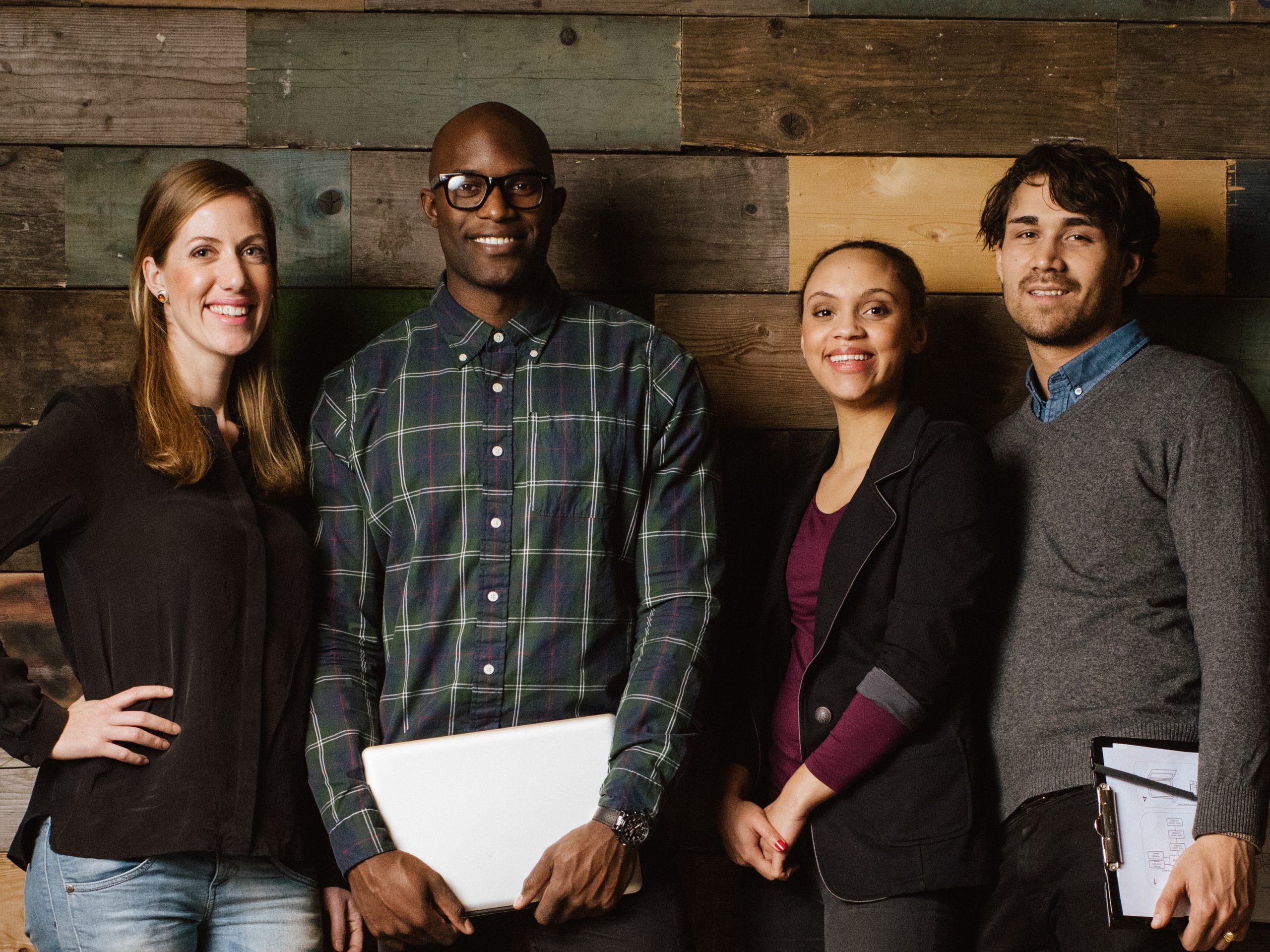 Portrait of successful business team standing in an office